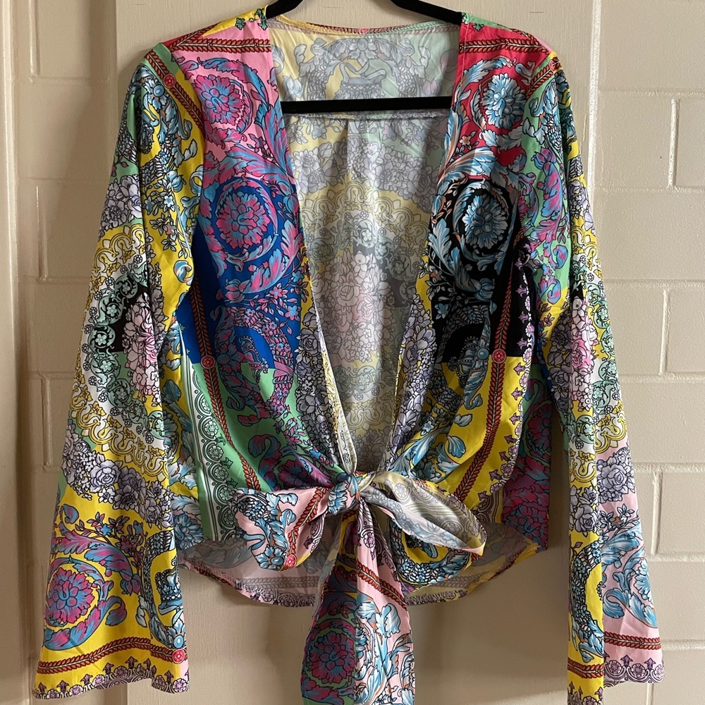 Wrap top. Purchased in boutique. NWOT